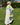 robe longue en gaze de coton écu à porter ouvert ou en robe, détails paillettes fluo dans le dos. Marque Gold and Silver