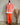 sweat rayé marque Johanna Paris coloris orange fluo avec capuche