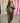 Blouson oversize vert olive Johanna Paris en simili cuir brillant, col montant, détails écrus contrastants et poignets élastiqués, du 36 au 44.