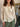 Chemise rayée crème Johanna Paris brodée de petites fleurs roses col officier coton. Broderies florales roses et feuilles vertes sur chemisier rayé Johanna Paris style bohème. Chemise femme Johanna Paris rayures et fleurs vêtement romantique chic.