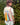 gilet sans manches légèrement matelassé, oeil arc en ciel multicolore brodé, petits boutons devant, marque The Corner, idéale avec la chemise flower brodée de la même marque