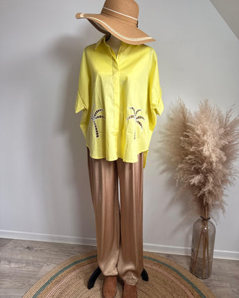 pantalon palazzo coloris doré, beige, effet brillant, élastiqué à la taille , stylé et confortable