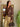 Veste courte en daim chocolat à œillets dorés LM Lulu Créatrice portée avec pantalon beige