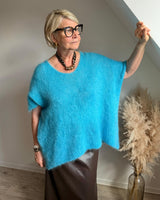 pull oversize sans manche en mohair bleu turquoise