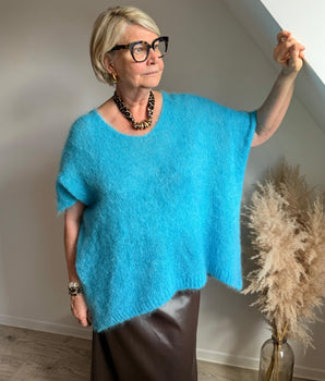 pull oversize sans manche en mohair bleu turquoise