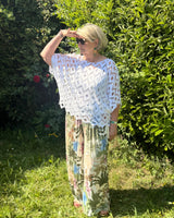 pantalon palazzo plissé à fleurs pour femme grande taille, coloris kaki ou orange, coupe fluide et taille élastique du 46 au 52 