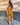 Robe mi-longue LM Lulu couleur safran à bretelles, imprimé feuillage, élastique au haut du dos et poches latérales.