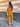 Robe mi-longue LM Lulu couleur safran à bretelles, imprimé feuillage, élastique au haut du dos et poches latérales.