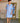 Robe forme trapèze unie manche ballon brodé coloris bleu ciel