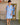Robe forme trapèze unie manche ballon brodé coloris bleu ciel