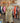 Robe longue rayée Johanna Paris écru et kaki à manches courtes, coupe ample bohème chic avec col chemise et poches, portée en boutique.