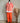sweat rayé marque Johanna Paris coloris orange fluo avec capuche
